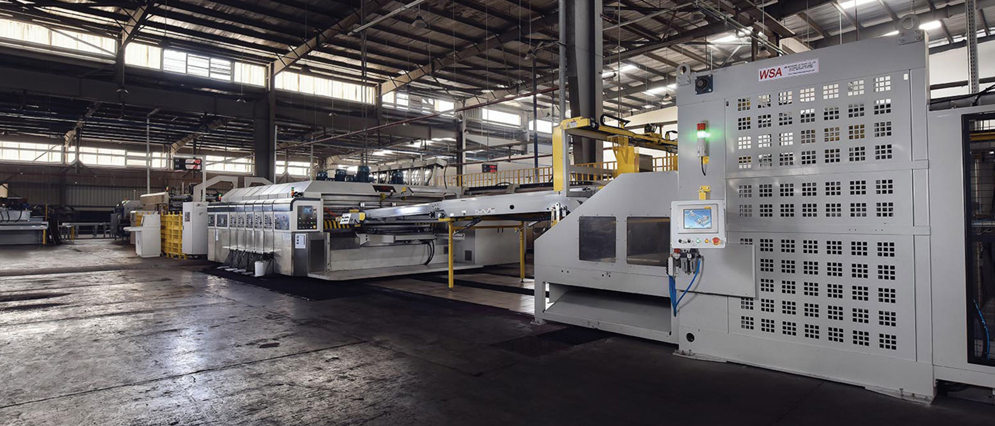 Corrugated cardboard sheets ready for custom packaging production